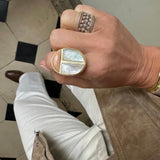 White mother-of-pearl scarab ring with peach moonstone